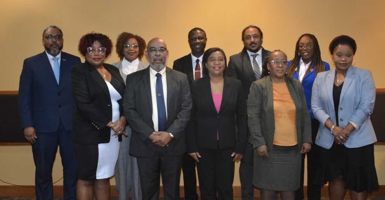 Members of the Newly Appointed SNLMC with The Hon. Mr. Stephen Mc Clashie, Minster of Labour, and Permanent Secretary, Natalie Willis